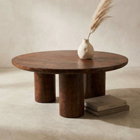 36 In. Dark Brown round Wood Scandinavian Coffee Table with Cylindrical Legs — Studio Shot