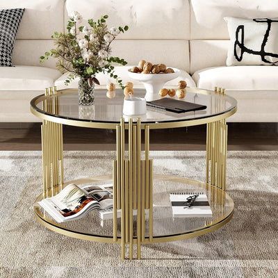 Coffee Table with Asymmetrical Gold Metal Base, 31.5" round Glass Top Center Accent Table, Circular Drum Design and Lower Display Shelf, Living Room Decor, Transparent